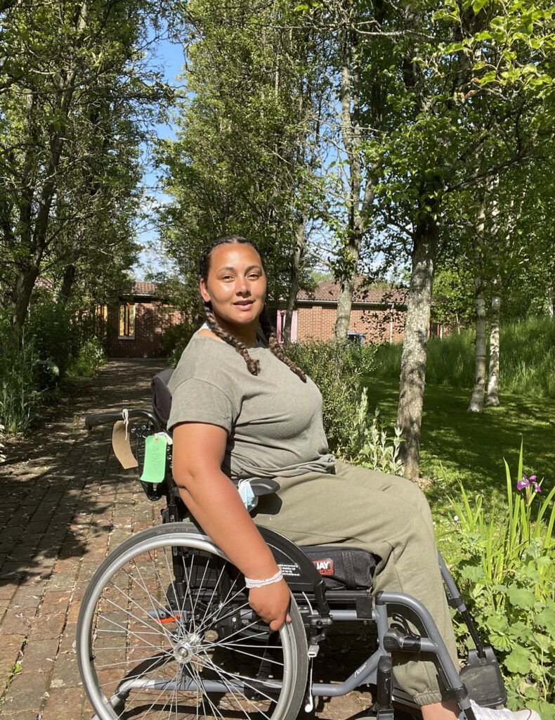 Zoe Fox in a wheelchair